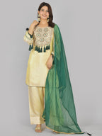 Megha Farsi green suit