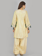 Megha Farsi green suit