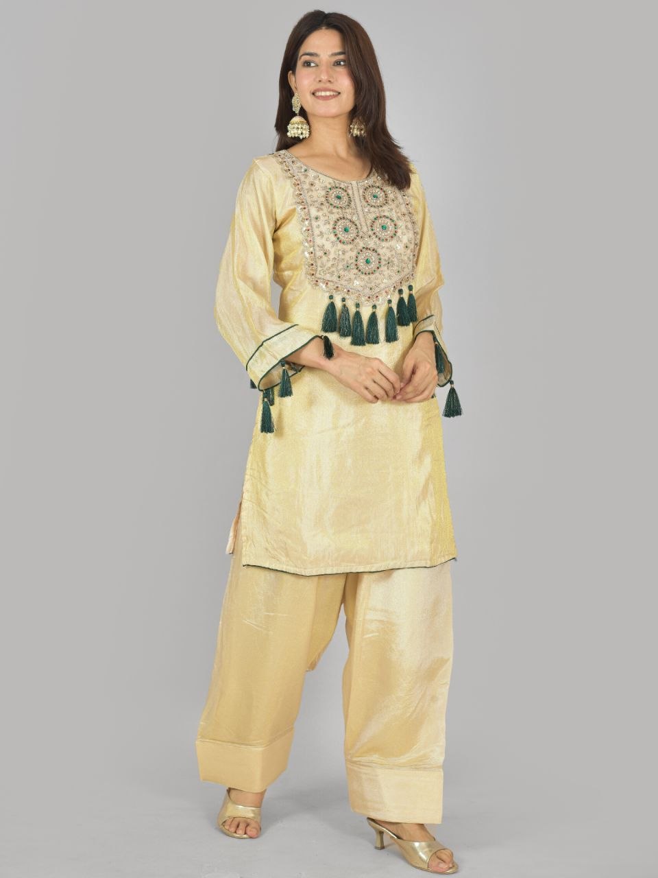 Megha Farsi green suit