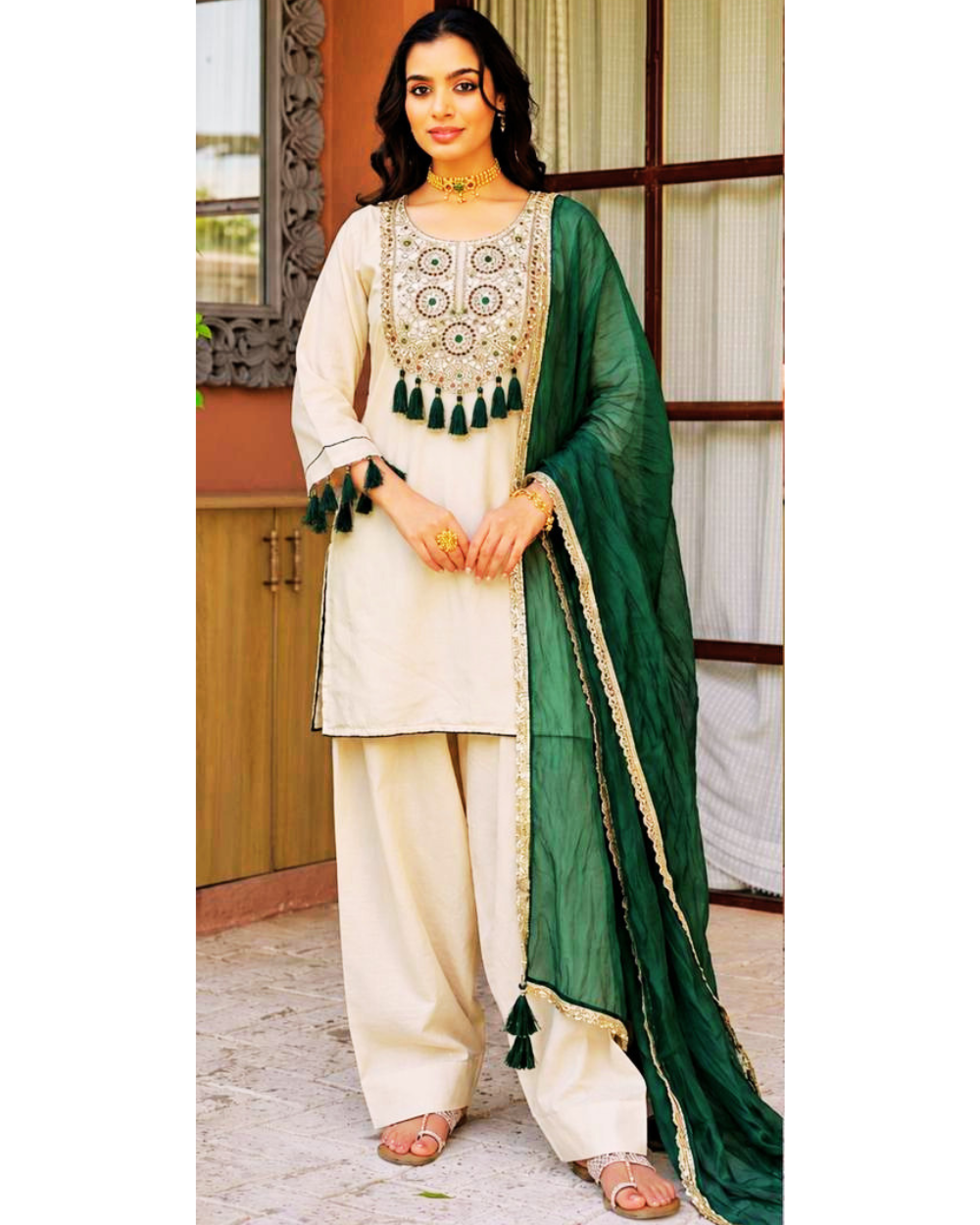 Megha Farsi green suit